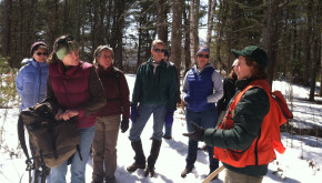 Maine Forest Service district forester Patty Cormier teaches women woodland owners about tree measurement