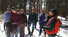 Maine Forest Service district forester Patty Cormier teaches women woodland owners about tree measurement