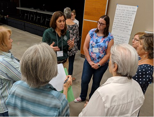 A North Carolina natural resource professional speaks with ForestHer NC workshop attendees in Piedmont, NC. 
