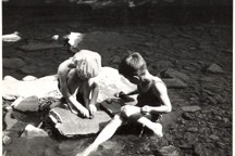 Children playing in the creek